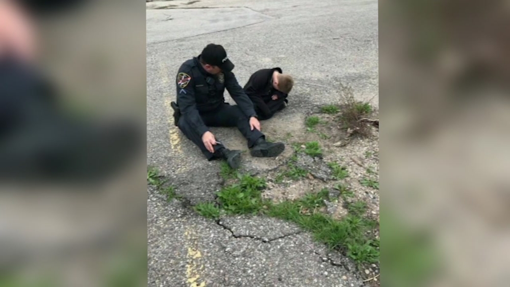 Officer goes viral for comforting boy with autism